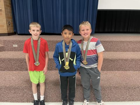 Brycen, Jose and Rowan after winning the spelling bee.