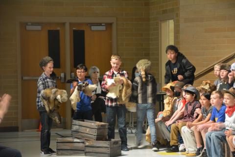 Students reenacting the fur trade.